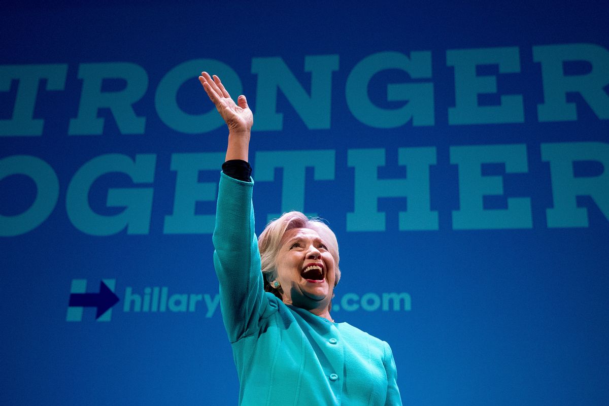 Democratic presidential candidate Hillary Clinton waves as she takes the stage to speak at a fundraiser at the Paramount Theatre in Seattle, Friday, Oct. 14, 2016. (AP Photo/Andrew Harnik) (AP)