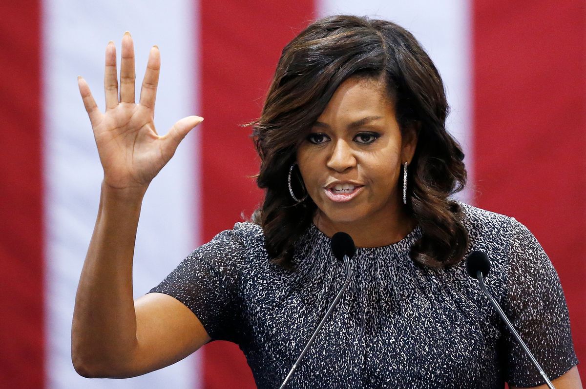 First lady Michelle Obama waves to the crowd after speaking during a campaign rally for Democratic presidential candidate Hillary Clinton Thursday, Oct. 20, 2016, in Phoenix. (AP Photo/Ross D. Franklin) (AP)