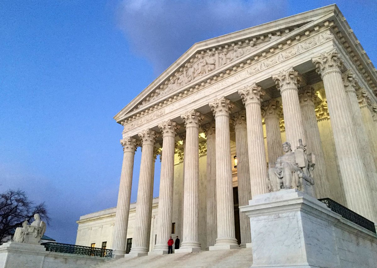 FILE - In this Feb. 13, 2016, file photo, people stand on the steps of the Supreme Court at sunset in Washington. The ideological direction of the Supreme Court is going to tip one way or the other after the election.  (AP)