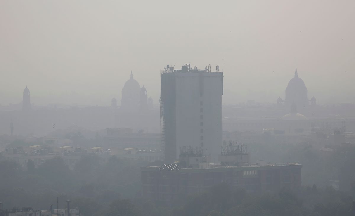 In this photo taken Friday, Oct. 28, 2016, a layer of smog envelops the city skyline before Diwali festival in New Delhi, India. As north Indian cities enter the season of high air pollution, a new report is warning about the dangers to children.  (AP Photo/Altaf Qadri) (AP)