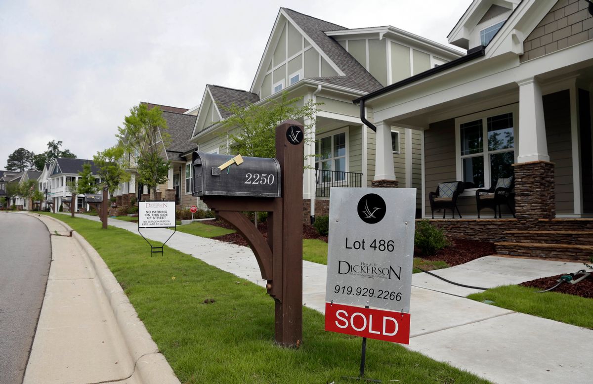 FILE - In this Tuesday, June 9, 2015, file photo, a "Sold" sign is displayed in the yard of a newly-constructed home in the Briar Chapel community in Chapel Hill, N.C. On Thursday, Oct. 27, 2016, Freddie Mac reports on the week's average U.S. mortgage rates. (AP Photo/Gerry Broome, File) (AP)