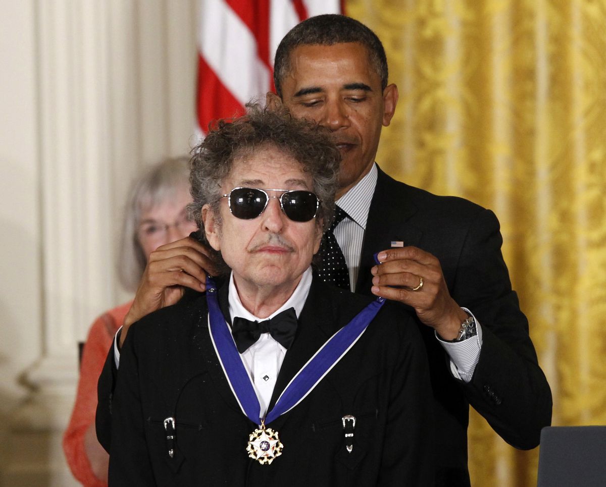 FILE - In this May 29, 2012, file photo, President Barack Obama presents rock legend Bob Dylan with a Medal of Freedom during a ceremony at the White House in Washington. Dylan won the 2016 Nobel Prize in literature, announced Thursday, Oct. 13, 2016.  (AP)