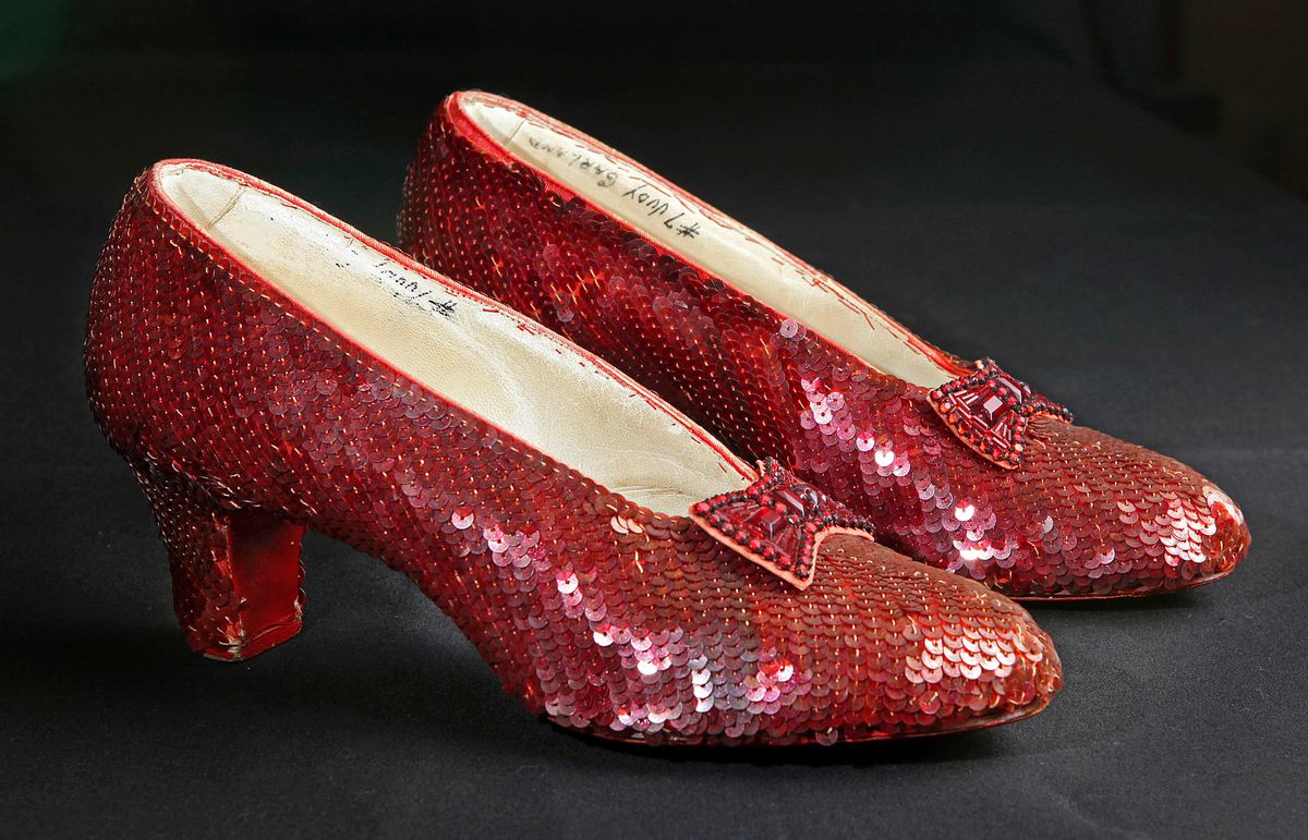 File- This Nov. 9, 2001, file photo shows the sequin-covered ruby slippers worn by Judy Garland in "The Wizard of Oz"  at the offices of Profiles in History in Calabasas, Calif. Smithsonian Museum officials started a Kickstarter fundraising drive Monday, Oct. 17, 2016,  to repair the iconic slippers from 1939’s “The Wizard of Oz” and create a new state-of-the-art display case for them at the National Museum of American History.  (AP Photo/Reed Saxon, File) (AP)