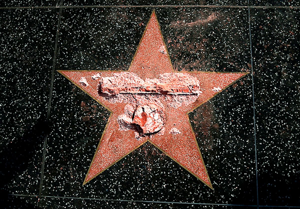 Donald Trump's star on the Hollywood Walk of Fame is seen after it was vandalized in Los Angeles, California U.S., October 26, 2016.   REUTERS/Mario Anzuoni        (REUTERS/Mario Anzuoni)