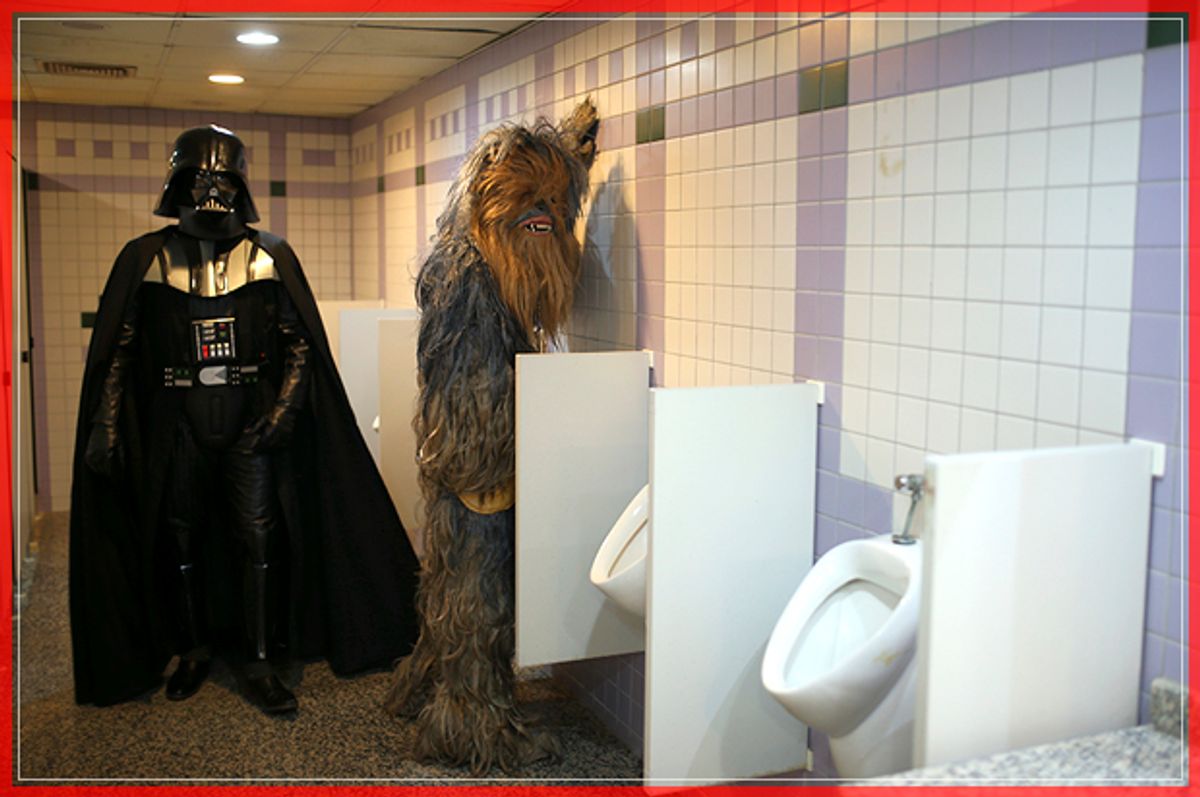 CORRECTS NAME - Fans dressed as Darth Vader, left, and Chewbacca are pictured in a bathroom as they attend 53rd Antalya Film Festival in Mediterranean Turkish resort of Antalya, Turkey, Monday, Oct. 17, 2016. (AP Photo/Emre Tazegul) (AP)