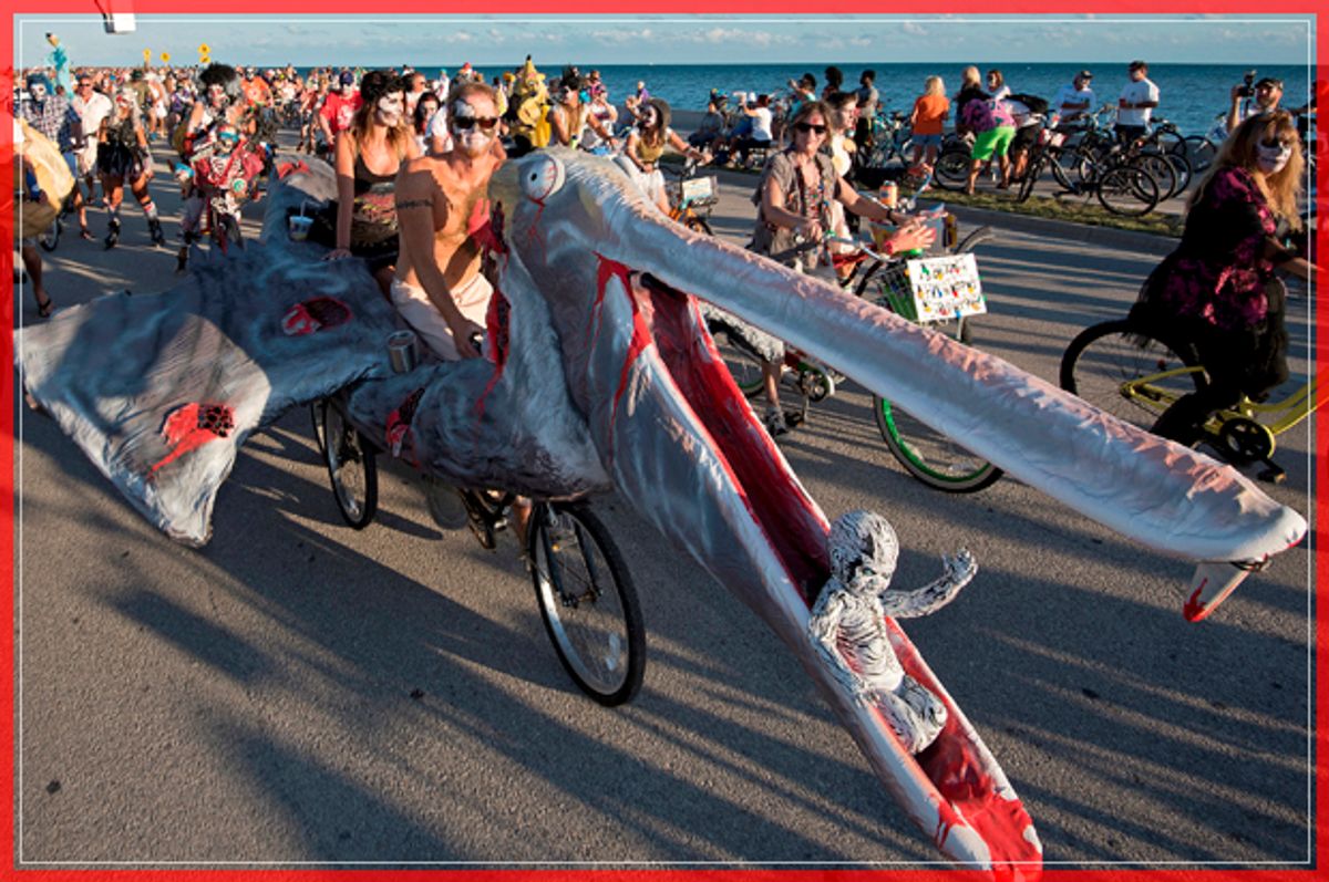 A zombie pelican bicycle is manoeuvred on South Roosevelt Boulevard during the Zombie Bike Ride as part of annual Fantasy Fest costuming and masking festival in Key West, Florida, U.S. October 23, 2016. Picture taken October 23, 2016.     Rob O'Neal/Florida Keys News Bureau/Handout via REUTERS    ATTENTION EDITORS - THIS IMAGE WAS PROVIDED BY A THIRD PARTY. EDITORIAL USE ONLY. THIS PICTURE WAS PROCESSED BY REUTERS TO ENHANCE QUALITY. AN UNPROCESSED VERSION HAS BEEN PROVIDED SEPARATELY.    TPX IMAGES OF THE DAY      - RTX2Q8WL (Reuters)