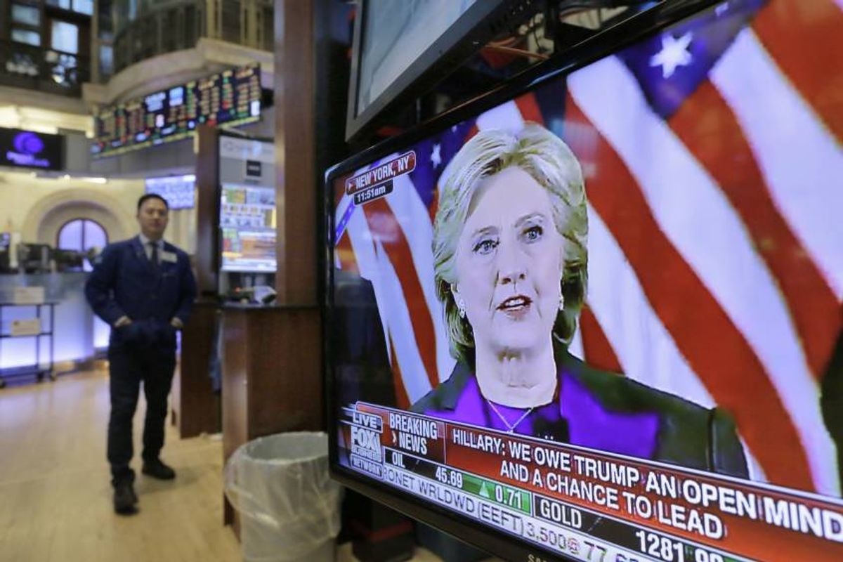 Democratic presidential candidate Hillary Clinton's speech is seen on a television screen on the floor of the New York Stock Exchange in New York. (AP)