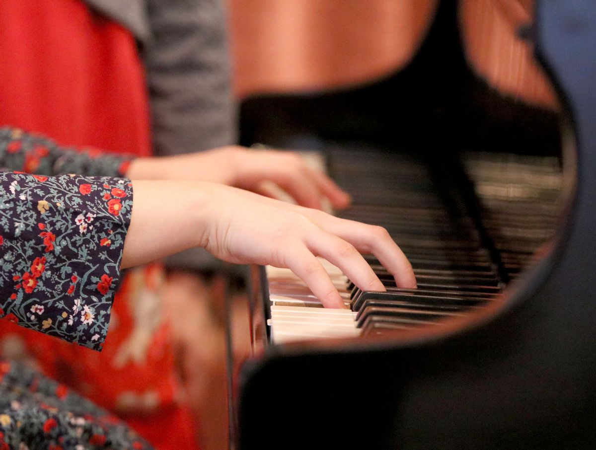 In this Nov. 17, 2016 picture Alma Deutscher plays piano during a rehearsal in Vienna, Austria. Alma Deutscher is a composer, virtuoso pianist and concert violinist who wrote her first sonata five years ago and whose first full opera will have its world premiere next month. All of which is special only because she 11. (AP Photo/Ronald Zak) (AP Photo/Ronald Zak)