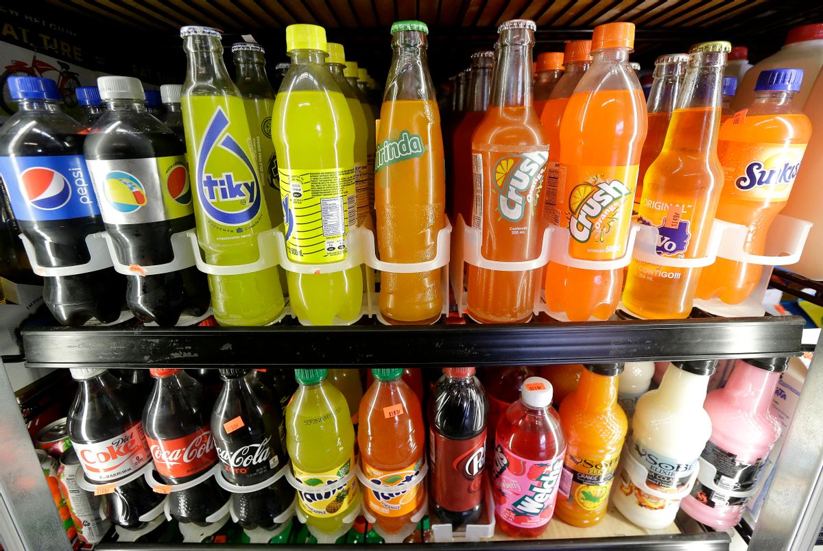 FILE - In this Wednesday, Sept. 21, 2016, file photo, soft drink and soda bottles are displayed in a refrigerator at El Ahorro market in San Francisco. (AP Photo/Jeff Chiu, File) (AP)