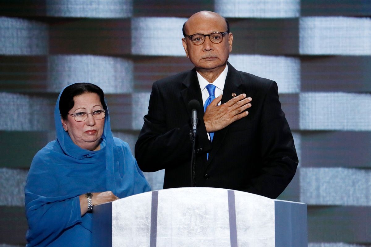 FILE - In this July 28, 2016, file photo, Khizr Khan, father of fallen Army Capt. Humayun Khan and his wife Ghazala speak during the final day of the Democratic National Convention in Philadelphia. Many Muslim Americans cringe at the way they have been portrayed by candidates during the presidential campaign, either as potential terrorists or as eyes and ears who can help counterterrorism efforts. Those descriptions have been offered by Donald Trump and Hillary Clinton, respectively. And they trouble Muslims who complain they are being pigeonholed and their concerns on other issues ignored. (AP Photo/J. Scott Applewhite, File) (AP)