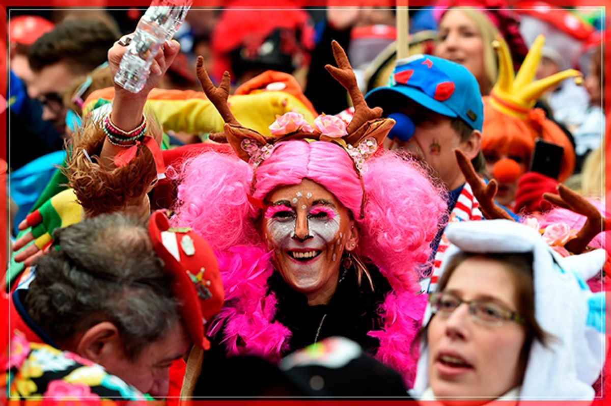 Revellers celebrate the start of the Carnival season in Cologne, on November 11, 2016. / AFP / PATRIK STOLLARZ        (Photo credit should read PATRIK STOLLARZ/AFP/Getty Images) (Afp/getty Images)