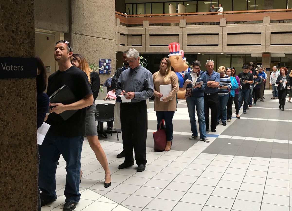 The line of voters waiting to cast an early ballot at the Santa Clara County Registrar of Voters' office winds into the building's atrium Monday, Nov. 7, 2016, in San Jose, Calif.  California elections officials are bracing for robust turnout, confused first-time voters and the prospect of long lines in a presidential election that has registered a record 19.4 million voters in the state. (Ramman Kenoun/Santa Clara Country Registrar of Voters via AP) (AP)