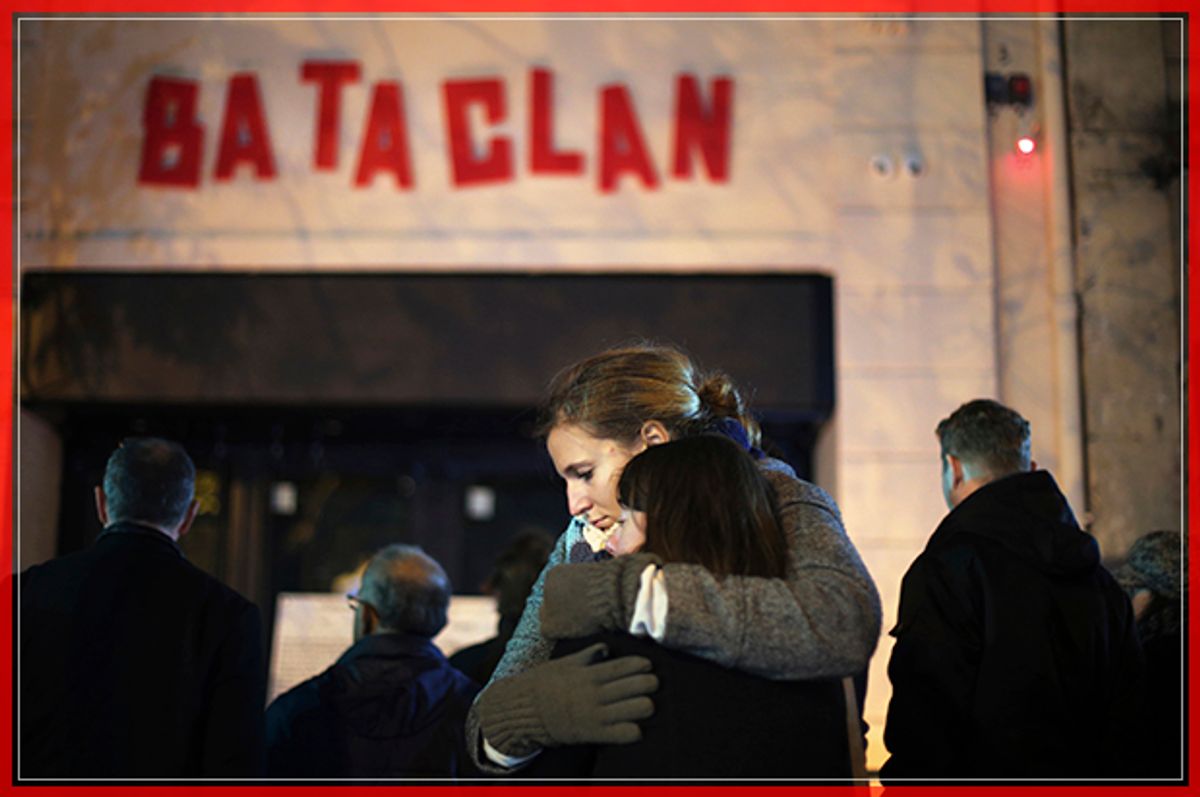 Women hug,  in front of the Bataclan concert hall in Paris, Sunday, Nov. 13, 2016.  France marked the anniversary of Islamic extremists' coordinated attacks on Paris with a somber silence on Sunday that was broken only by voices reciting the names of the 130 slain, and the son of the first person to die stressing the importance of integration. (AP Photo/Thibault Camus) (AP)