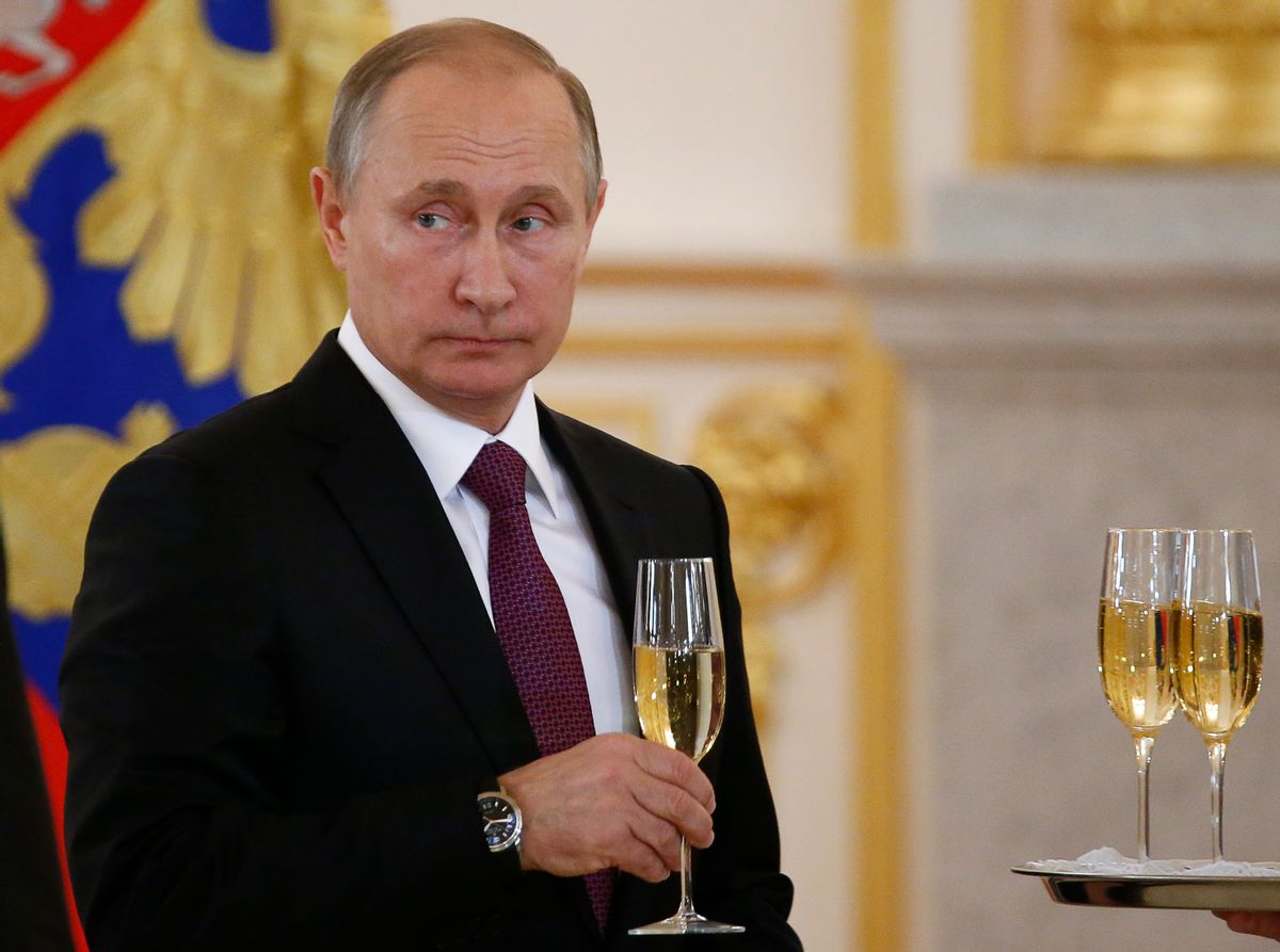 In this Nov. 9, 2016, photo, Russian President Vladimir Putin makes a toast during a ceremony for receiving diplomatic credentials from foreign ambassadors in the Kremlin in Moscow, Russia. In careful phrasing befitting the spy he once was, Vladimir Putin has made it clear he expects a great deal from President-elect Donald Trump. And, the billionaire businessman may expect a transactional relationship with Putin. (Sergei Karpukhin/Pool photo via AP) (AP)
