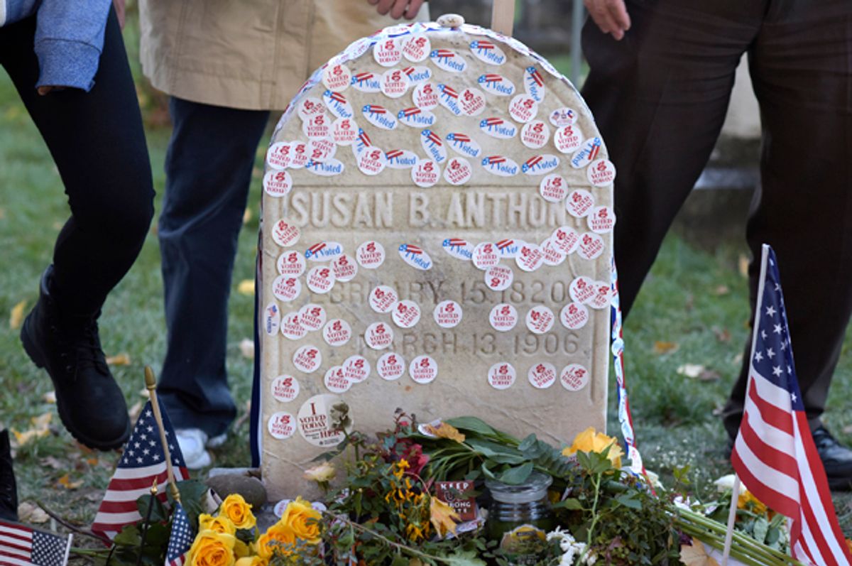People visit the grave of Susan B. Anthony at Mount Hope Cemetery in Rochester, New York November 8, 2016.   (Reuters/Adam Fenster)