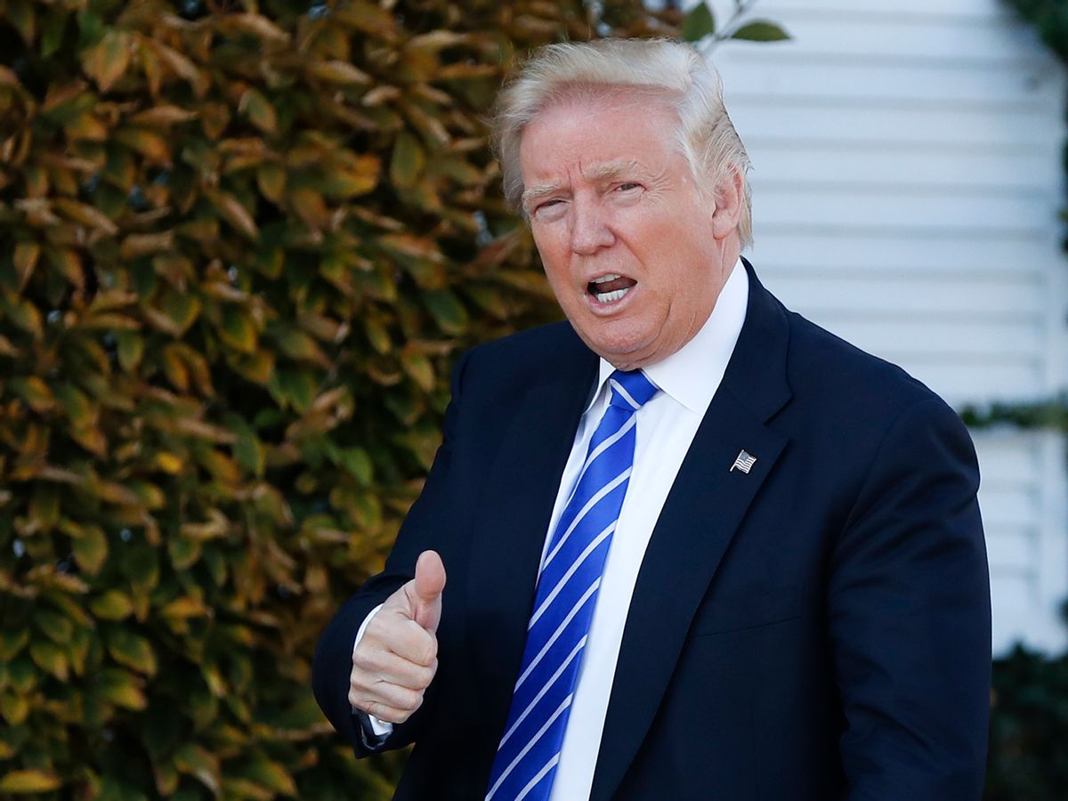 FILE - In this Nov. 19, 2016, file photo, President-elect Donald Trump gives the thumbs-up as he arrive at the Trump National Golf Club Bedminster clubhouse in Bedminster, N.J. Trump, ethics attorneys and good-government groups are all grappling with how to navigate being a president with extraordinary international and domestic business ties. While others in government are bound by rules and regulations about their business ties, the president has fewer such restrictions. (AP Photo/Carolyn Kaster, File) (AP)