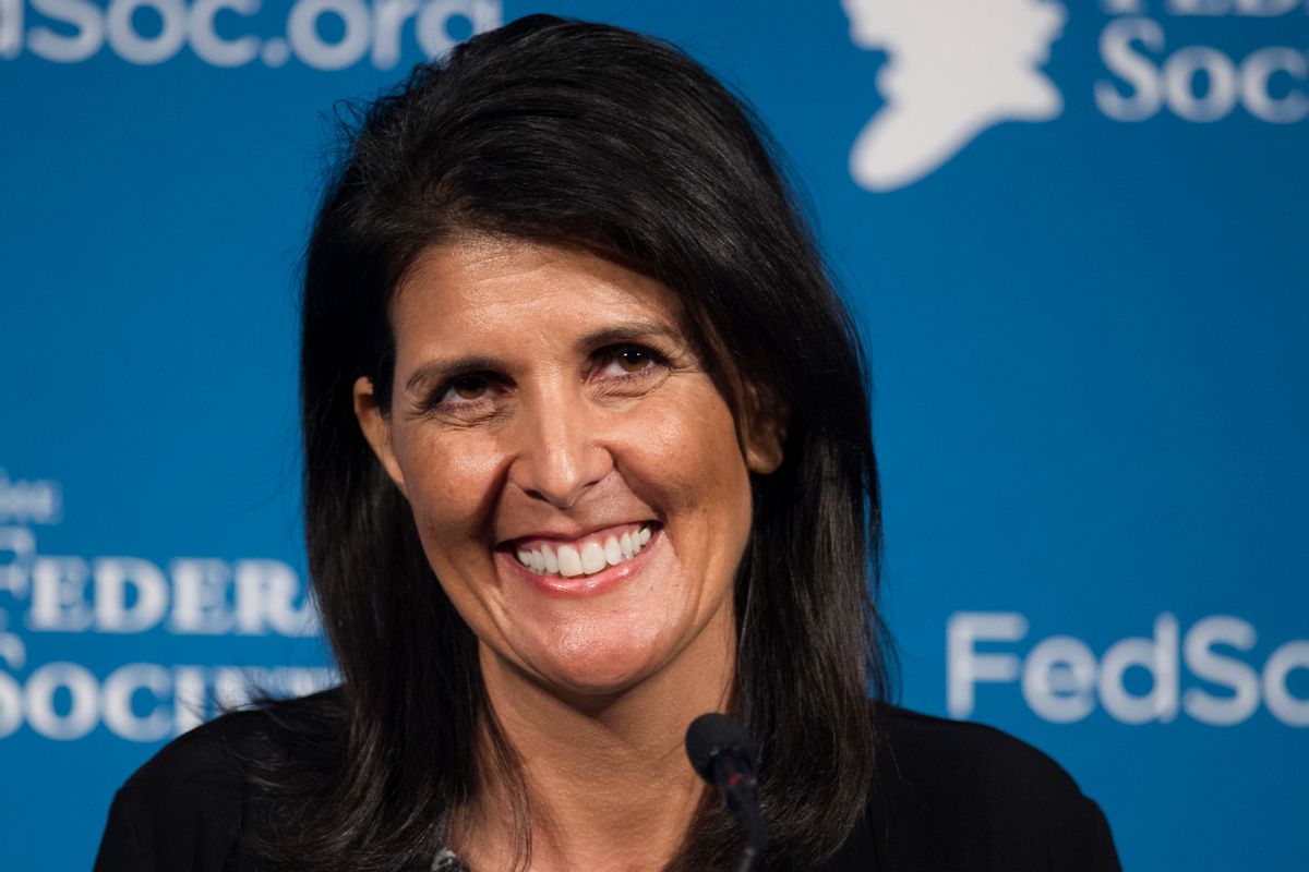 FILE - In this Friday, Nov. 18, 2016 photo, South Carolina Gov. Nikki Haley smiles while speaking at the Federalist Society's National Lawyers Convention in Washington. President-elect Donald Trump has chosen Haley as U.S. ambassador to the United Nations, and he will treat the ambassadorship as a Cabinet-level position, according to two sources familiar with Trump's decision who requested anonymity to discuss the decision and its announcement. Haley, an outspoken Trump critic throughout much of the presidential race, would become his first female - and first nonwhite - Cabinet-level official if confirmed by the Senate. (AP Photo/Cliff Owen, File) (AP)