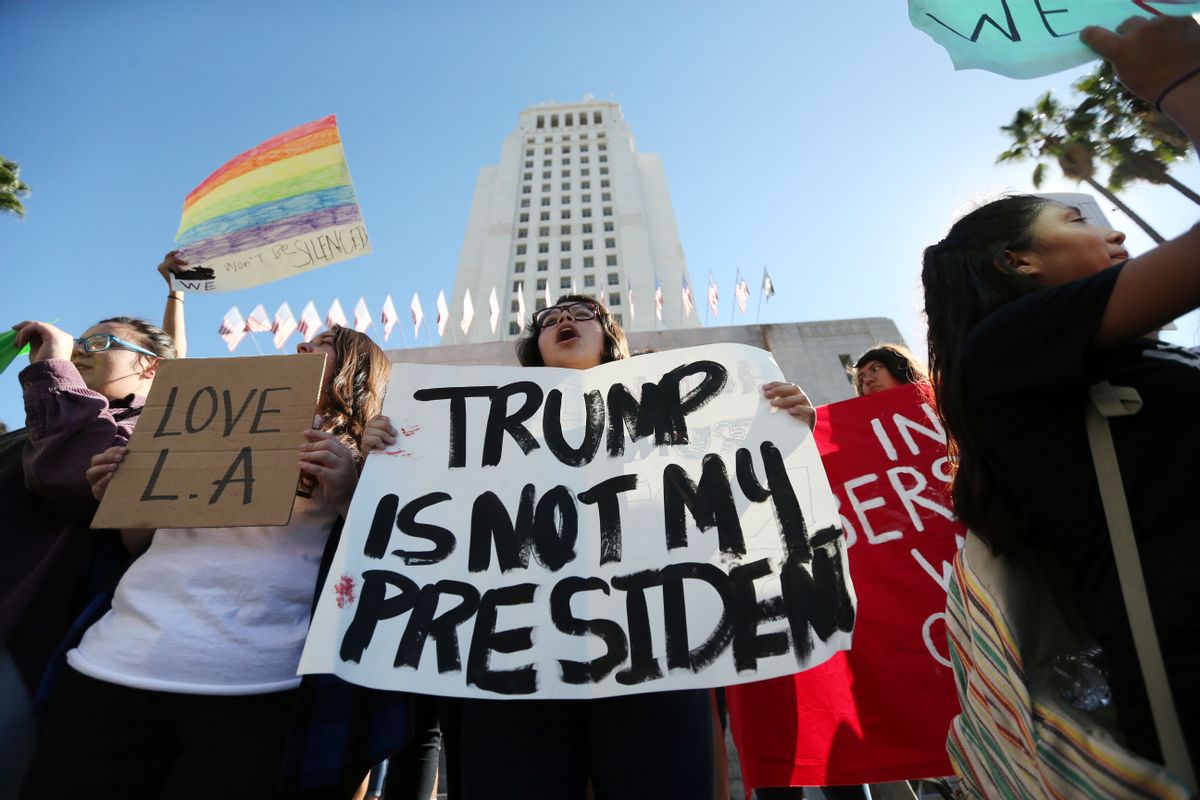 Students from several high schools rally after walking out of classes to protest the election of Donald Trump at City Hall in downtown Los Angeles. (AP)