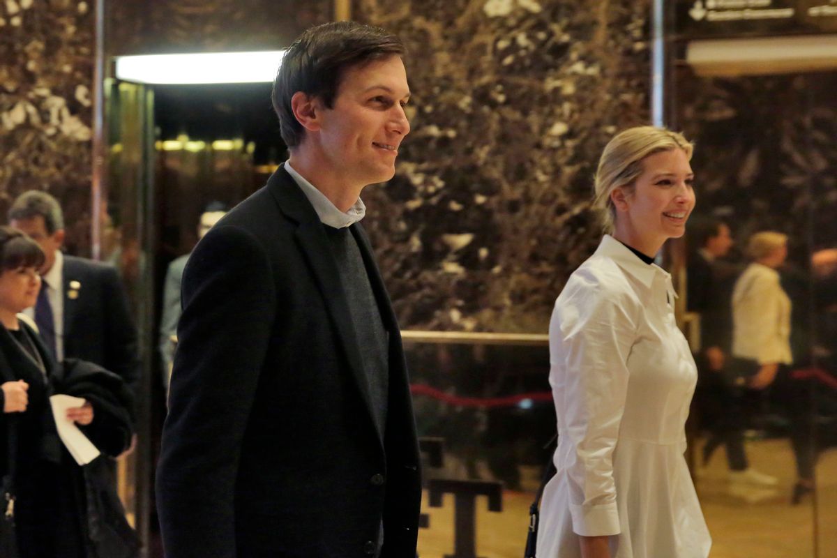 Jared Kushner and his wife Ivanka Trump walk through the lobby of Trump Tower in New York. (AP)