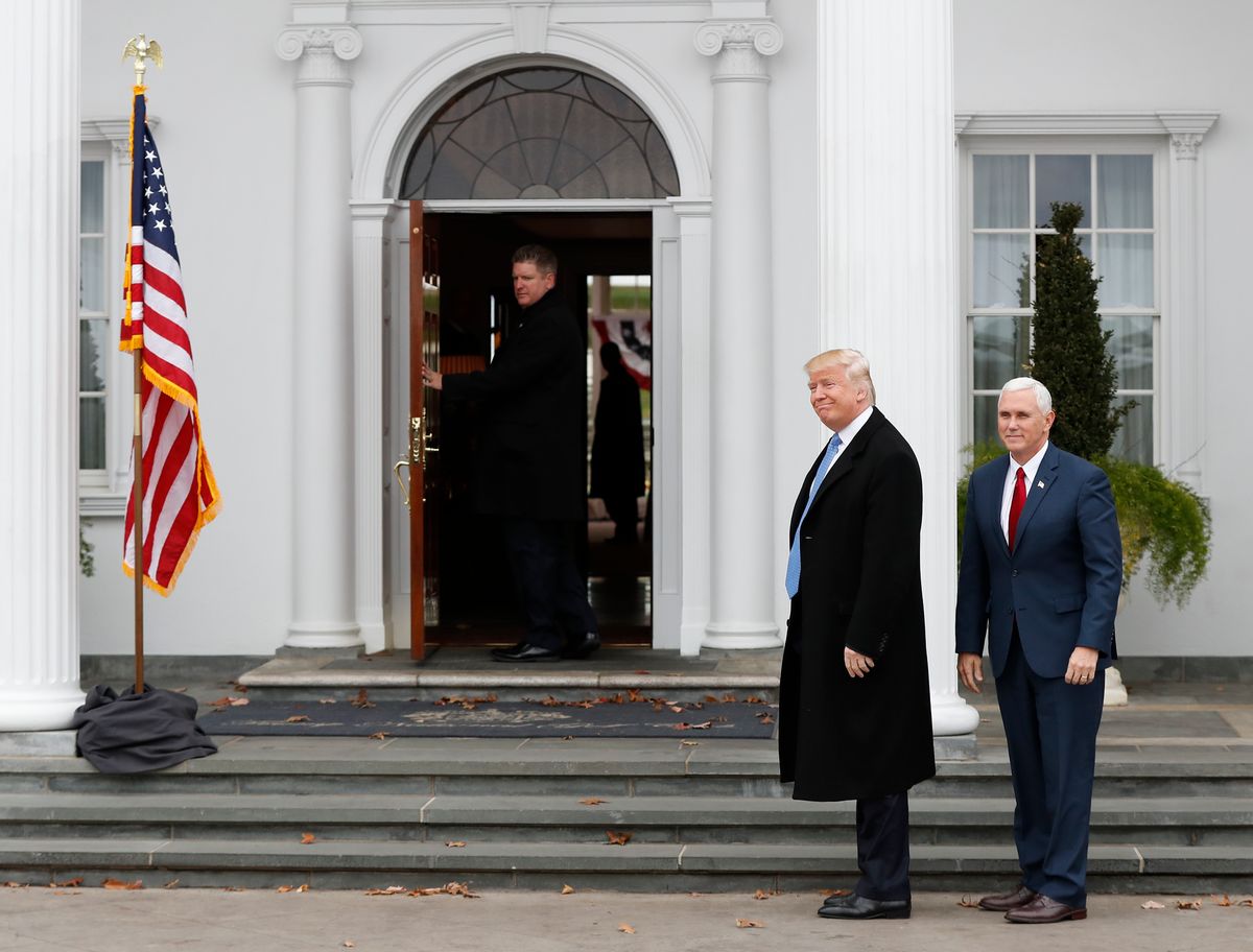 President-elect Donald Trump and Vice President-elect Mike Pence, right, arrive at the Trump National Golf Club Bedminster clubhouse, Sunday, Nov. 20, 2016 in Bedminster, N.J. (AP)