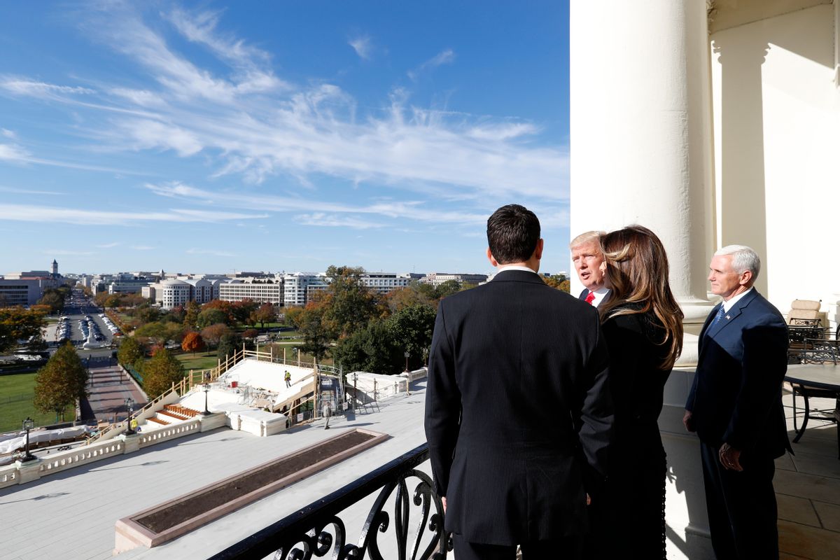 House Speaker Paul Ryan of Wis. shows President-elect Donald Trump, his wife Melania and Vice president-elect Mike Pence the view of the inaugural stand that is being built and Pennsylvania Avenue from the Speaker's Balcony on Capitol Hill in Washington. (AP)