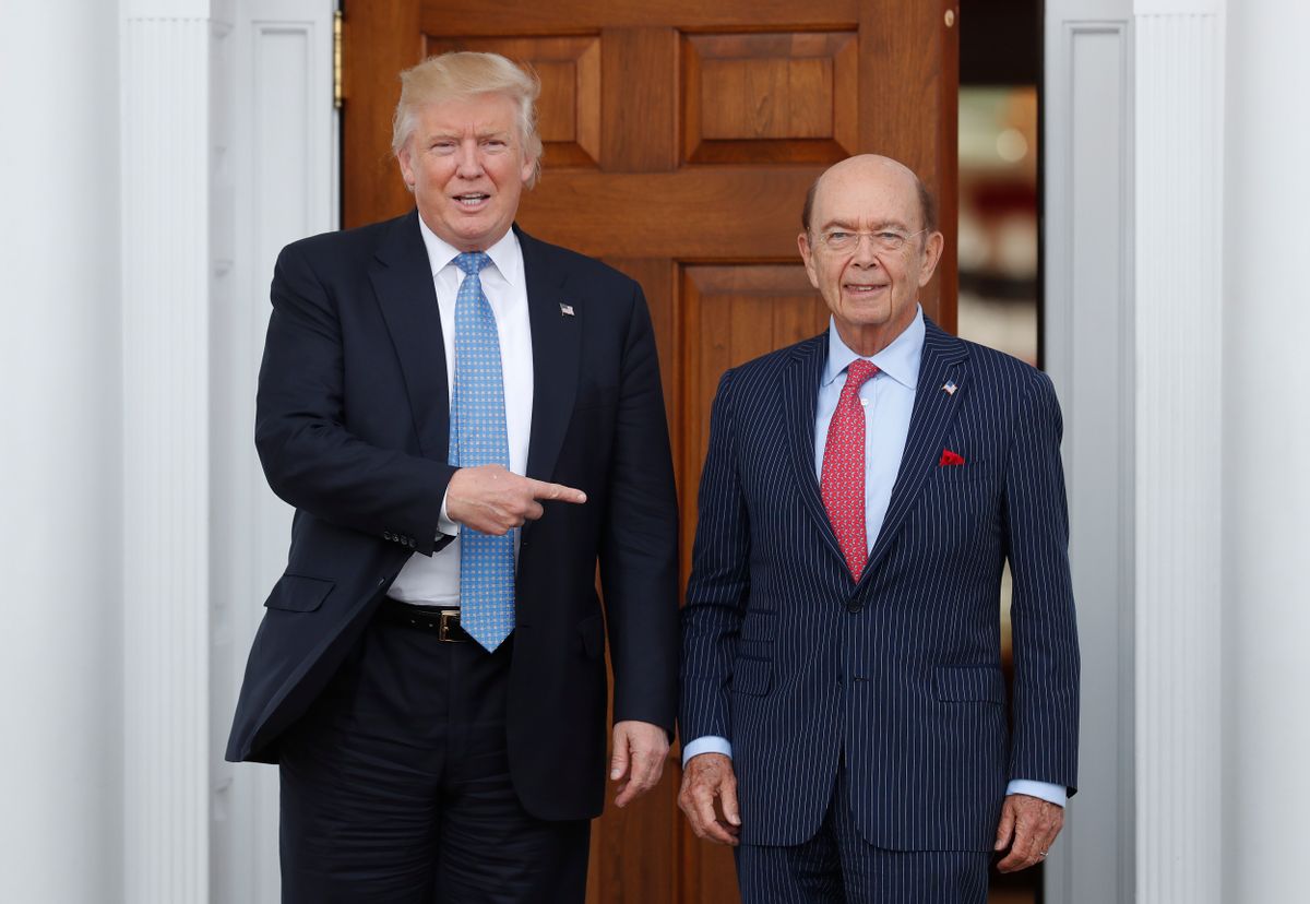 In this Sunday, Nov. 20, 2016, file photo, President-elect Donald Trump, left, stands with investor Wilbur Ross after meeting at the Trump National Golf Club Bedminster clubhouse in Bedminster, N.J.  (AP)