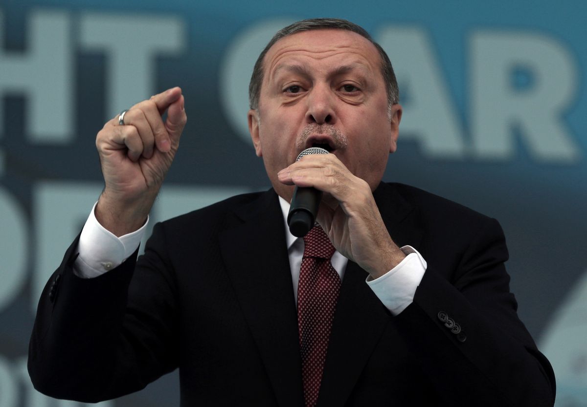 FILE - In this Oct. 29, 2016 file photo, Turkey's President Recep Tayyip Erdogan addresses his supporters during a ceremony for a new train station building on the Republic Day in Ankara, Turkey. Since quashing a July coup attempt, Turkey’s president has used extraordinary powers from a state of emergency to arrest and purge thousands of opponents. Recep Tayyip Erdogan has also vowed to back public demands to reinstate the death penalty and suggested submitting Turkey's long-sought goal of European Union membership to a referendum. (AP Photo/Burhan Ozbilici, File) (AP)