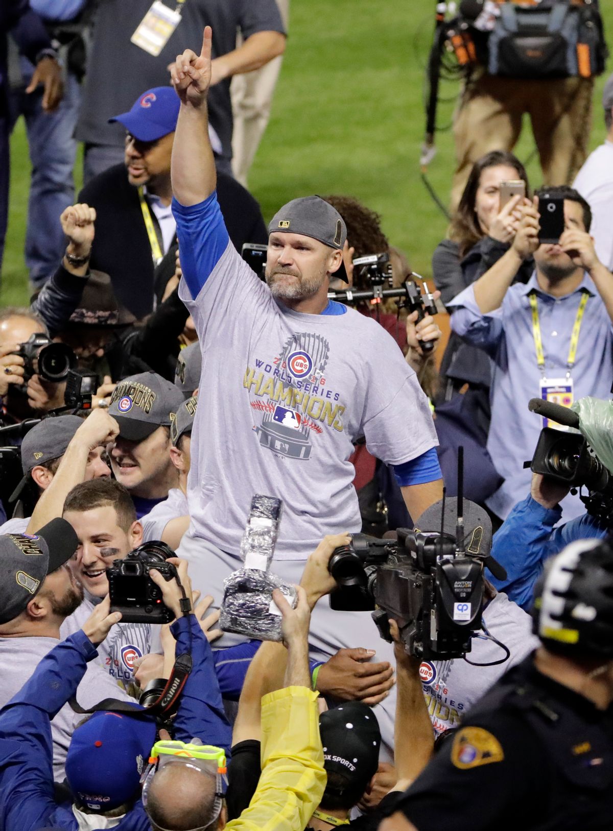 Chicago Cubs' David Ross is carried by teammates after Game 7 of the Major League Baseball World Series against the Cleveland Indians Thursday, Nov. 3, 2016, in Cleveland. The Cubs won 8-7 in 10 innings to win the series 4-3. (AP Photo/Gene J. Puskar) (AP)
