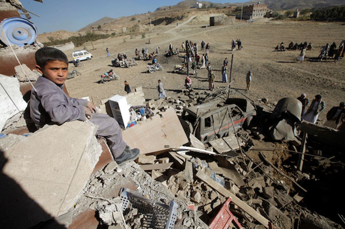 A Yemeni boy sits on the wreckage of a house destroyed by a U.S.-backed, Saudi-led airstrike on the outskirts of Sanaa, Yemen, November 13, 2016  (Reuters/Mohamed al-Sayaghi)