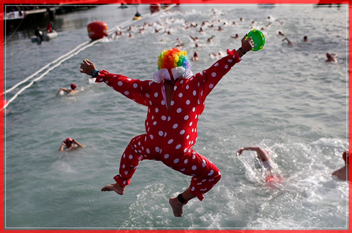 An athlete dressed as a clown jumps into the Mediterranean sea as he takes part in the Copa Nadal in the Spanish port of Barcelona in Barcelona, Spain, Sunday, Dec. 25, 2016. The Copa Nadal (Christmas Cup) is a traditional swimming competition that takes place in Barcelona every December 25th, where participants swim 200 meters in the open sea in the port of Barcelona. (AP Photo/Manu Fernandez) (AP)