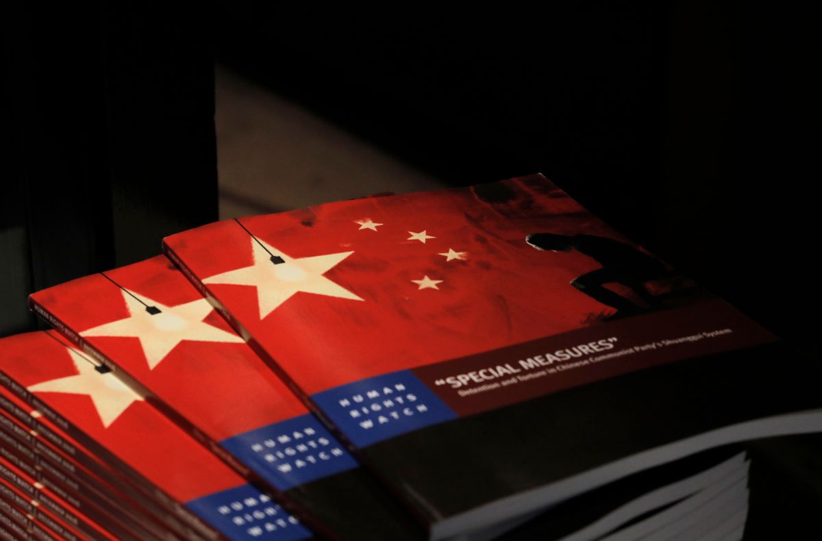 Copies of the new report by Human Rights Watch are seen at The Foreign Correspondents' Club in Hong Kong, Tuesday, Dec. 6, 2016. (AP)