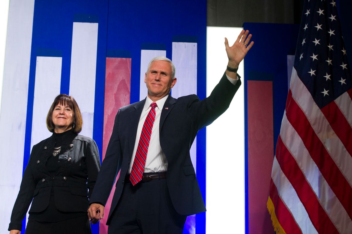 Vice President-elect Mike Pence and his wife Karen walks onstage at the Heritage Foundation's 2016 President's Club Meeting in Washington, Tuesday, Dec. 6, 2016. (AP)