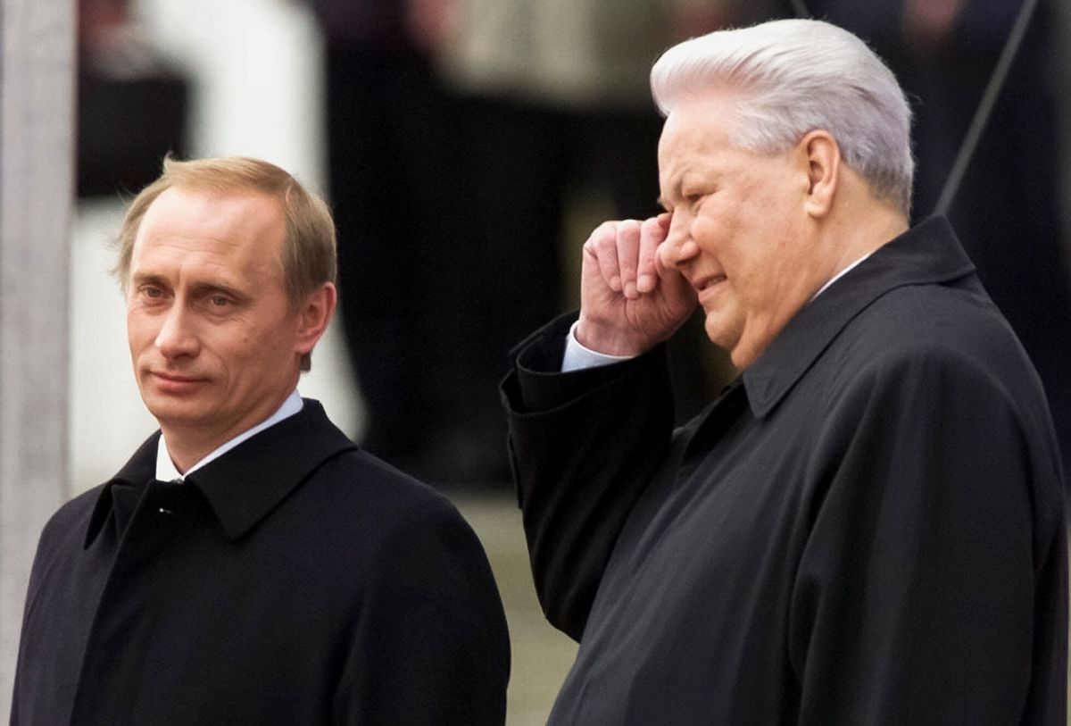 FILE In this file photo taken on Sunday, May 7, 2000, Russian President Vladimir Putin, left, and former President Boris Yeltsin watch Kremlin guards marching in Moscow's Kremlin, Russia. When Alexander Zemlianichenko started working as an AP photographer in Moscow, the Soviet Union was nearing its demise. (AP Photo/Alexander Zenlianichenko, file) (AP Photo/Alexander Zenlianichenko, file)