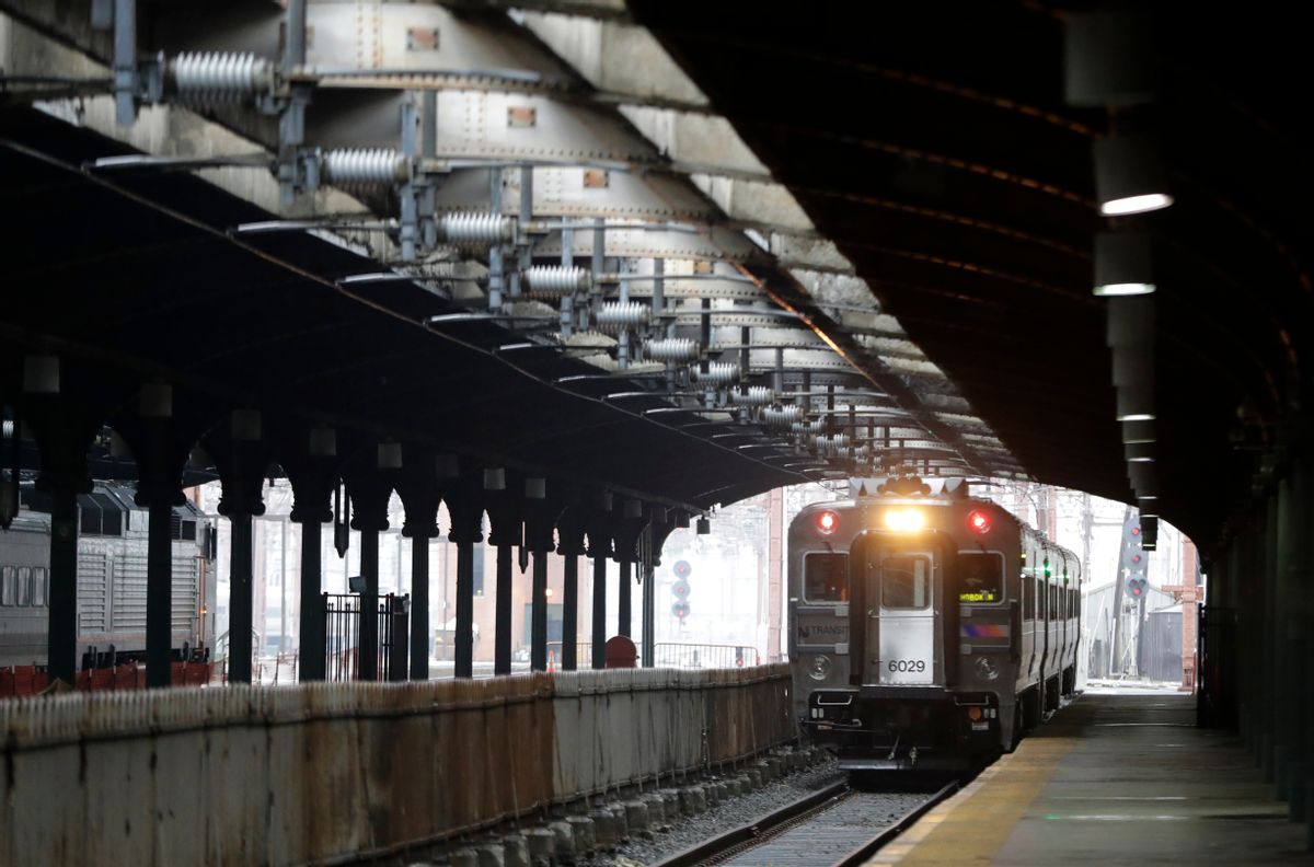 In a photograph taken Wednesday, Nov. 30, 2016, a New Jersey Transit train approaches the Hoboken Train Terminal on Track 4 in Hoboken, N.J. (AP Photo/Julio Cortez) (AP Photo/Julio Cortez)