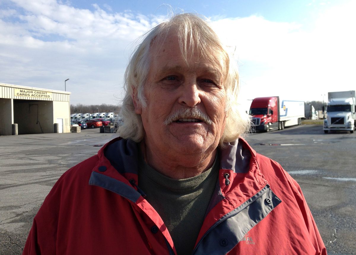 Truck driver Bill Varnado of Dallas, Ga., talks at a truck stop along Interstate 81 in Hagerstown, Md., on Wednesday, Dec. 7, 2016. He says he opposes Congress suspending a requirement for truckers to take two nights off to rest after a work week of up to 75 hours. He says the rule ensures that drivers get needed sleep. (AP Photo/David Dishneau) (AP)