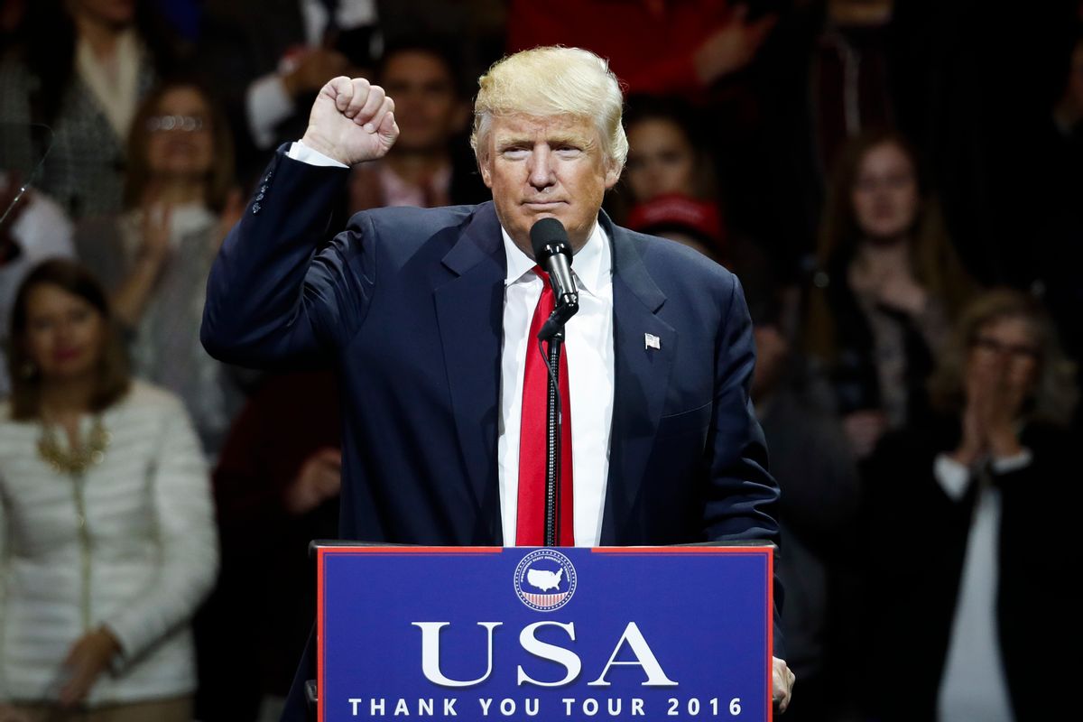 President-elect Donald Trump raises his fist as he speaks during the first stop of his post-election tour, Thursday, Dec. 1, 2016, in Cincinnati. (AP Photo/John Minchillo) (AP)