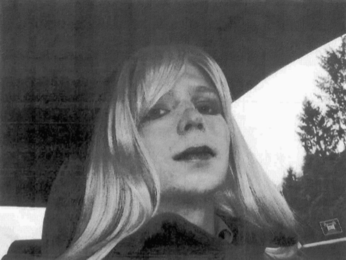 FILE - In this undated file photo provided by the U.S. Army, Pfc. Chelsea Manning poses for a photo wearing a wig and lipstick. On Tuesday, Jan. 17, 2017, President Barack Obama commuted the sentence of Chelsea Manning, who leaked Army documents and is serving 35 years. (U.S. Army via AP, File) (AP)