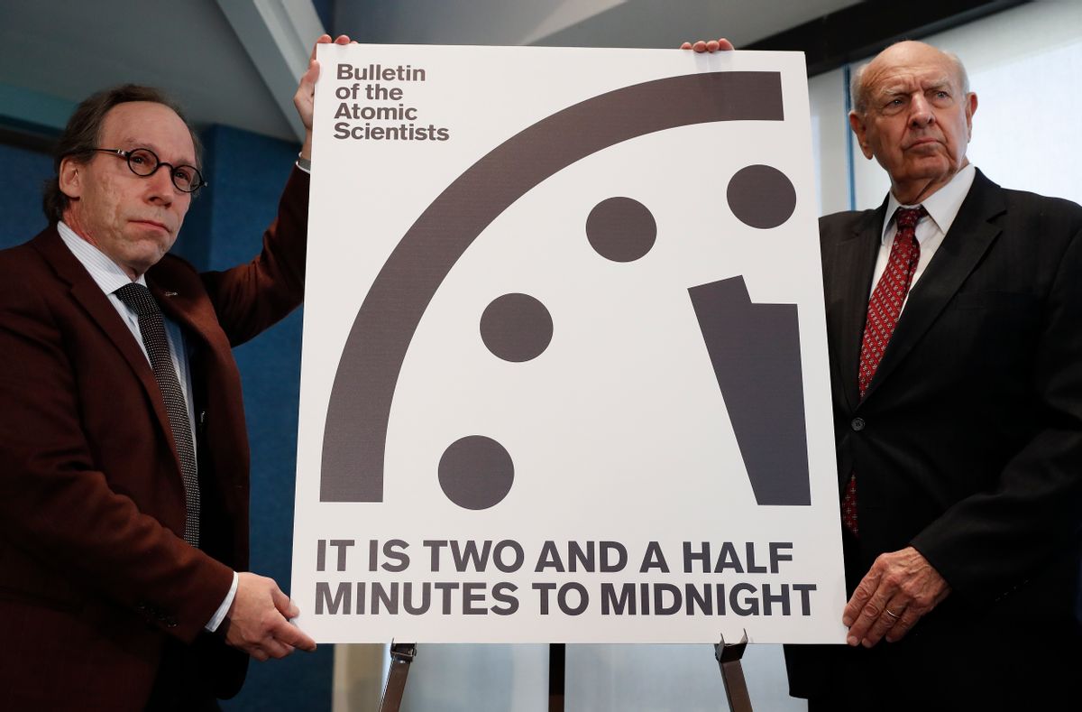Lawrence Krauss, theoretical physicist, chair of the Bulletin of the Atomic Scientists Board of Sponsors, left, and Thomas Pickering, co-chair of the International Crisis Group, display the Doomsday Clock during a news conference the at the National Press Club in Washington, Thursday, Jan. 26, 2017, announcing that the Bulletin of the Atomic Scientist have moved the minute hand of the Doomsday Clock to two and a half minutes to midnight. (AP Photo/Carolyn Kaster) (AP)