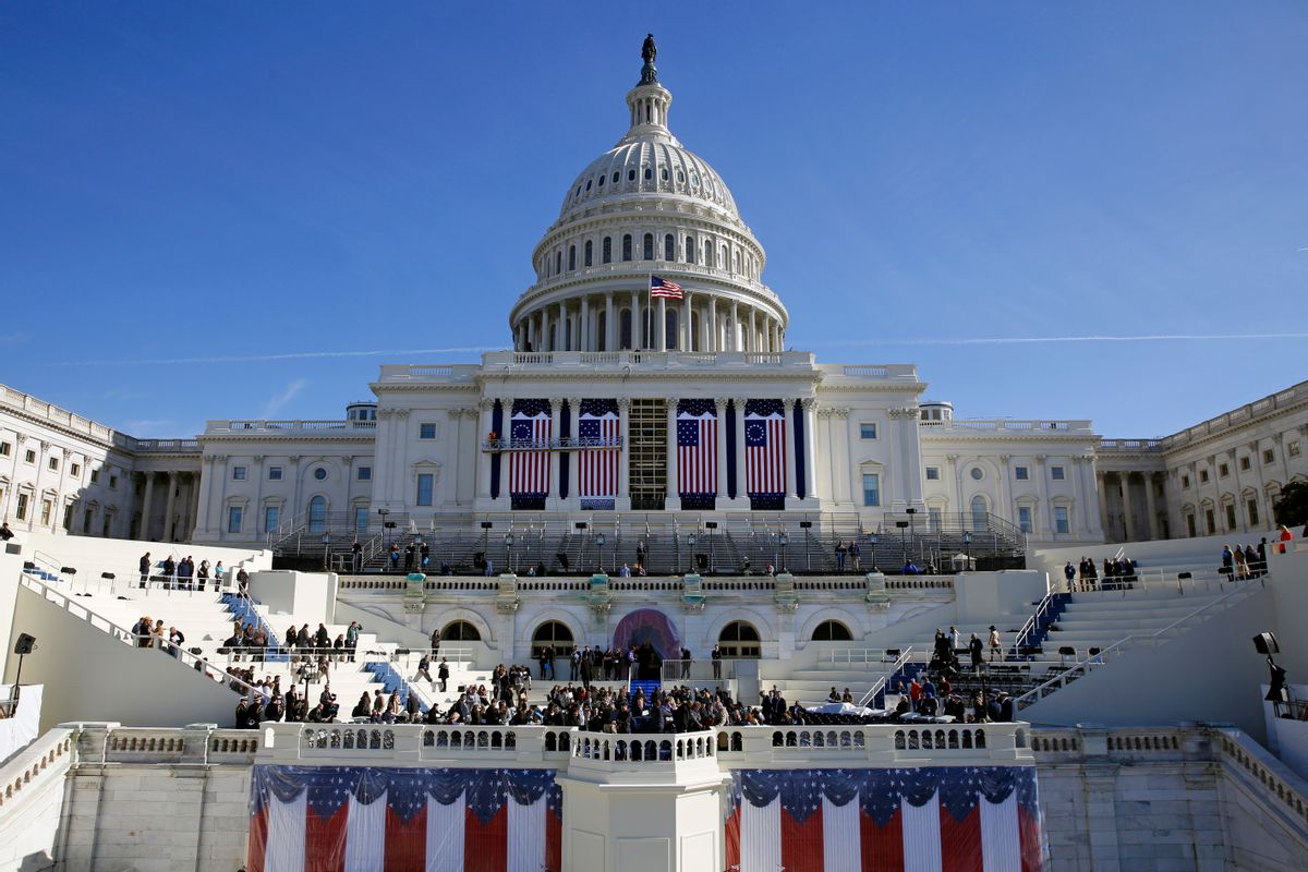 In this Jan. 15, 2016, photo, the U.S. Capitol frames the backdrop over the stage during a rehearsal of President-elect Donald Trump's swearing-in ceremony in Washington. (AP Photo/Patrick Semansky)