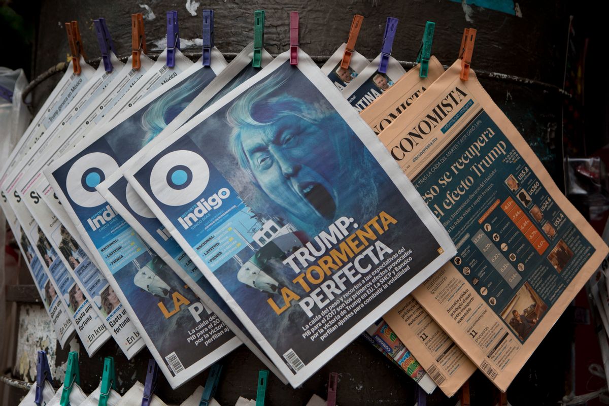 FILE - In this Nov. 10, 2016 file photo, a newspaper headline reads in Spanish: "Trump: The Perfect Storm," for sale at a news kiosk in Mexico City. The article's subtitle points to the fall in the value of the Mexican peso and cuts to Mexico's GDP expectations for 2017 as the first effects on Mexico provoked by the election of Donald Trump as the next U.S. president. (AP Photo/Rebecca Blackwell, File) (AP)