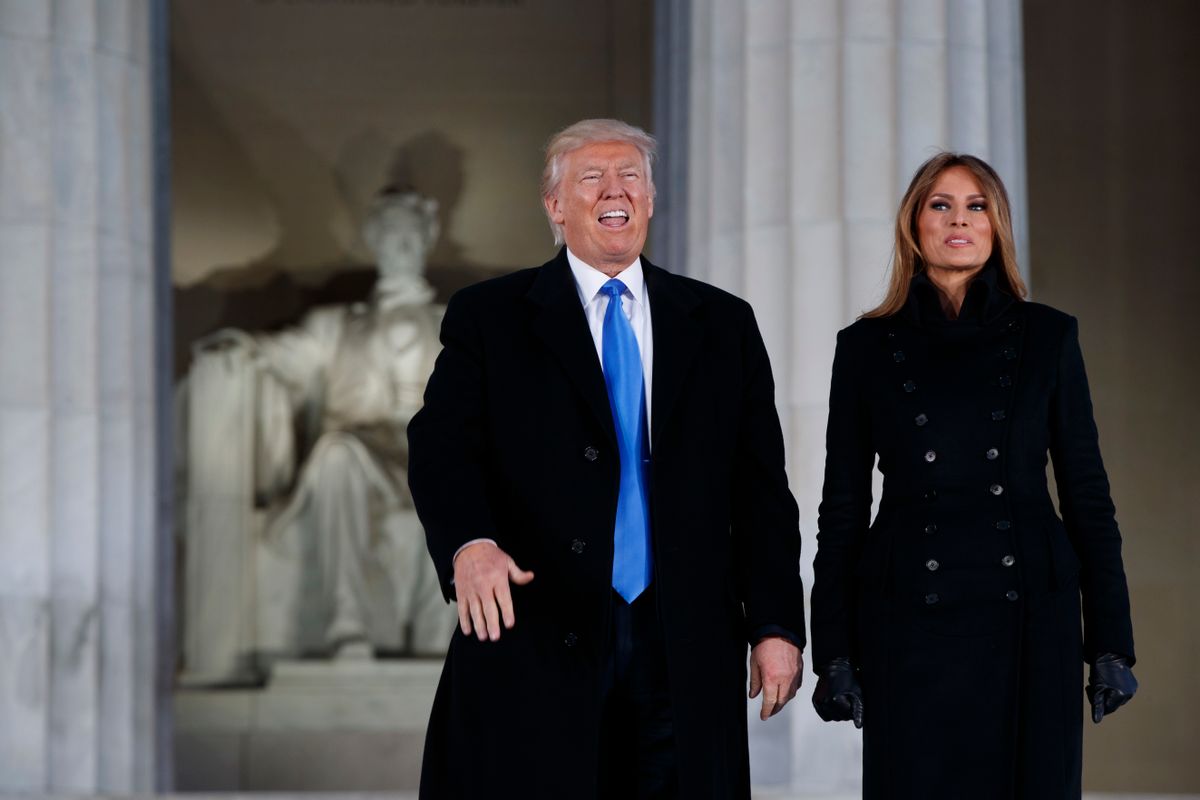 President-elect Donald Trump, left, and his wife Melania Trump arrive to the "Make America Great Again Welcome Concert" at the Lincoln Memorial, Thursday, Jan. 19, 2017, in Washington. (AP Photo/Evan Vucci) (AP)