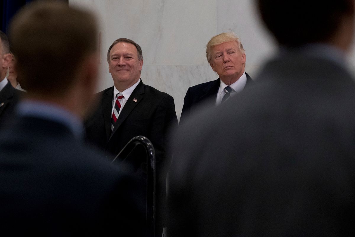 President Donald Trump, accompanied by CIA Director-designate Mike Pompeo, left, waits to speak at the Central Intelligence Agency in Langley, Va., Saturday, Jan. 21, 2017. (AP Photo/Andrew Harnik) (AP)