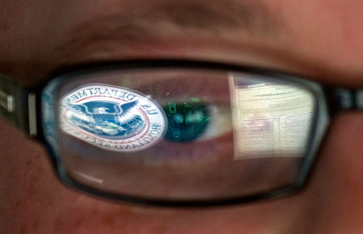 FILE - In this Sept. 30, 2011, file photo, a reflection of the Department of Homeland Security logo is seen reflected in the glasses of a cyber security analyst in the watch and warning center at the Department of Homeland Security's secretive cyber defense facility at Idaho National Laboratory in Idaho Falls, Idaho. Through history, the United States has relied on its borders and superior military might to protect against and deter foreign aggressors. But a lack of boundaries and any rulebook in cyberspace has increased the threat and leveled the playing field today. (AP Photo/Mark J. Terrill, File) (AP)