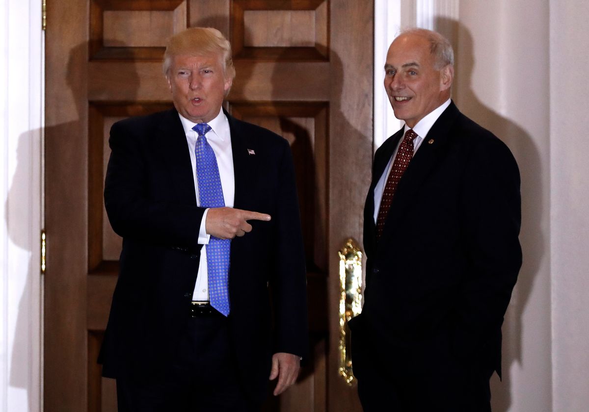 FILE - In this Nov. 20, 2016 file photo, President-elect Donald Trump talks to media as he stands with  retired Marine Gen. John Kelly at the Trump National Golf Club Bedminster clubhouse in Bedminster, N.J. Kelly is likely to be pressed about plans to build a border wall and other steps to boost immigration security at a Senate confirmation hearing on Jan. 10, for President-elect Donald Trump’s pick for Homeland Security secretary. (AP Photo/Carolyn Kaster, File) (AP)