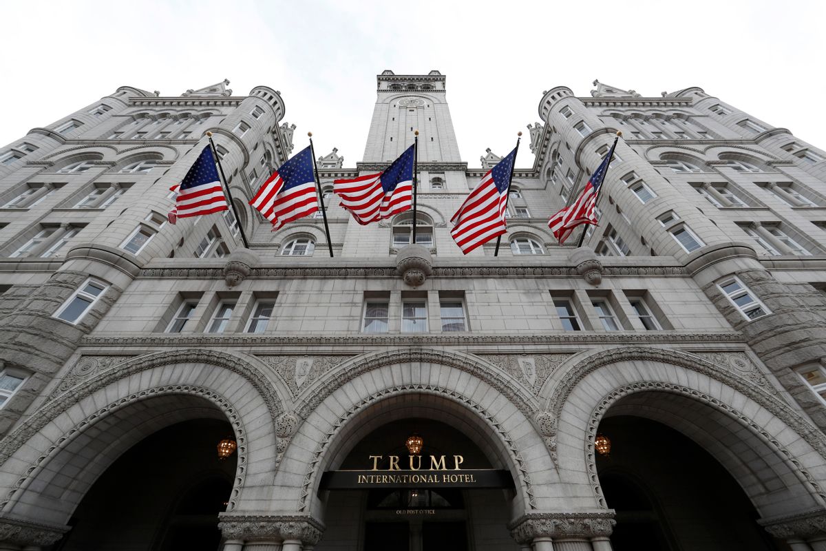 FILE - In this Dec. 21, 2106 file photo, the Trump International Hotel in Washington. An electrical subcontractor who worked on the Trump International Hotel in Washington has sued a company owned by President Donald Trump for more than $2 million, alleging it was not fully paid. (AP Photo/Alex Brandon, File) (AP)