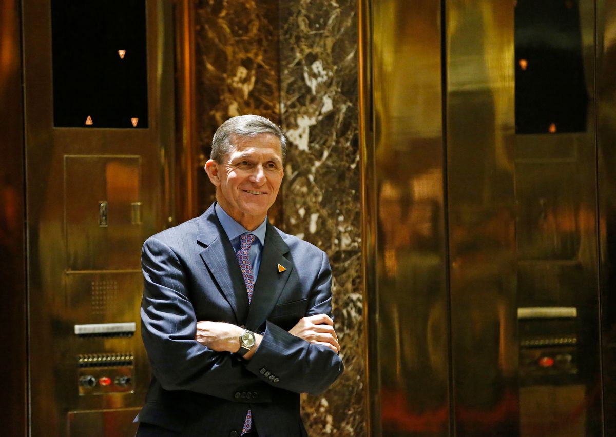 FILE - In this Dec. 12, 2016 file photo, National Security Adviser-designate Michael T. Flynn waits for an elevator in the lobby at Trump Tower in New York. The Obama administration is aware of frequent contacts between President-elect Donald Trump’s top national security adviser Michael Flynn and Russia’s ambassador to the United States, including on the day President Barack Obama hit Moscow with sanctions in retaliation for election-related hacking, a senior U.S. official said Friday, Jan. 13, 2017.  () (AP Photo/Kathy Willens, File)