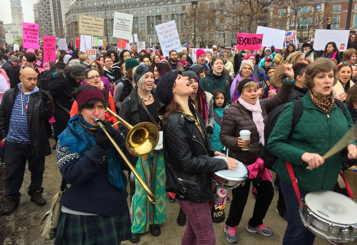 Protesters gather for the Women's March on Philadelphia a day after Republican Donald Trump's inauguration as president, Saturday, Jan. 21, 2017 in Philadelphia.  The march is being held in solidarity with similar events taking place in Washington and around the nation.  () (AP Photo/Jacqueline Larma)