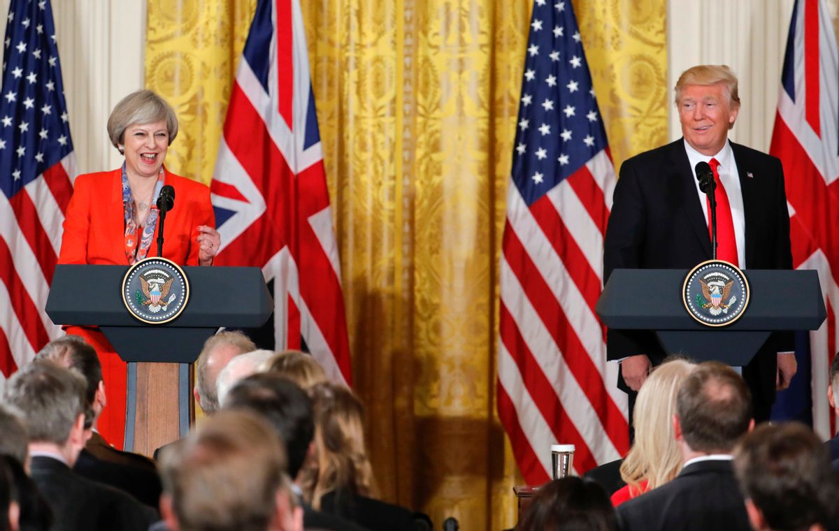 President Donald Trump and British Prime Minister Theresa May react to a question from a member of the media during their joint news conference in the East Room of the White House White House in Washington, Friday, Jan. 27, 2017. (AP Photo/Pablo Martinez Monsivais) (AP)