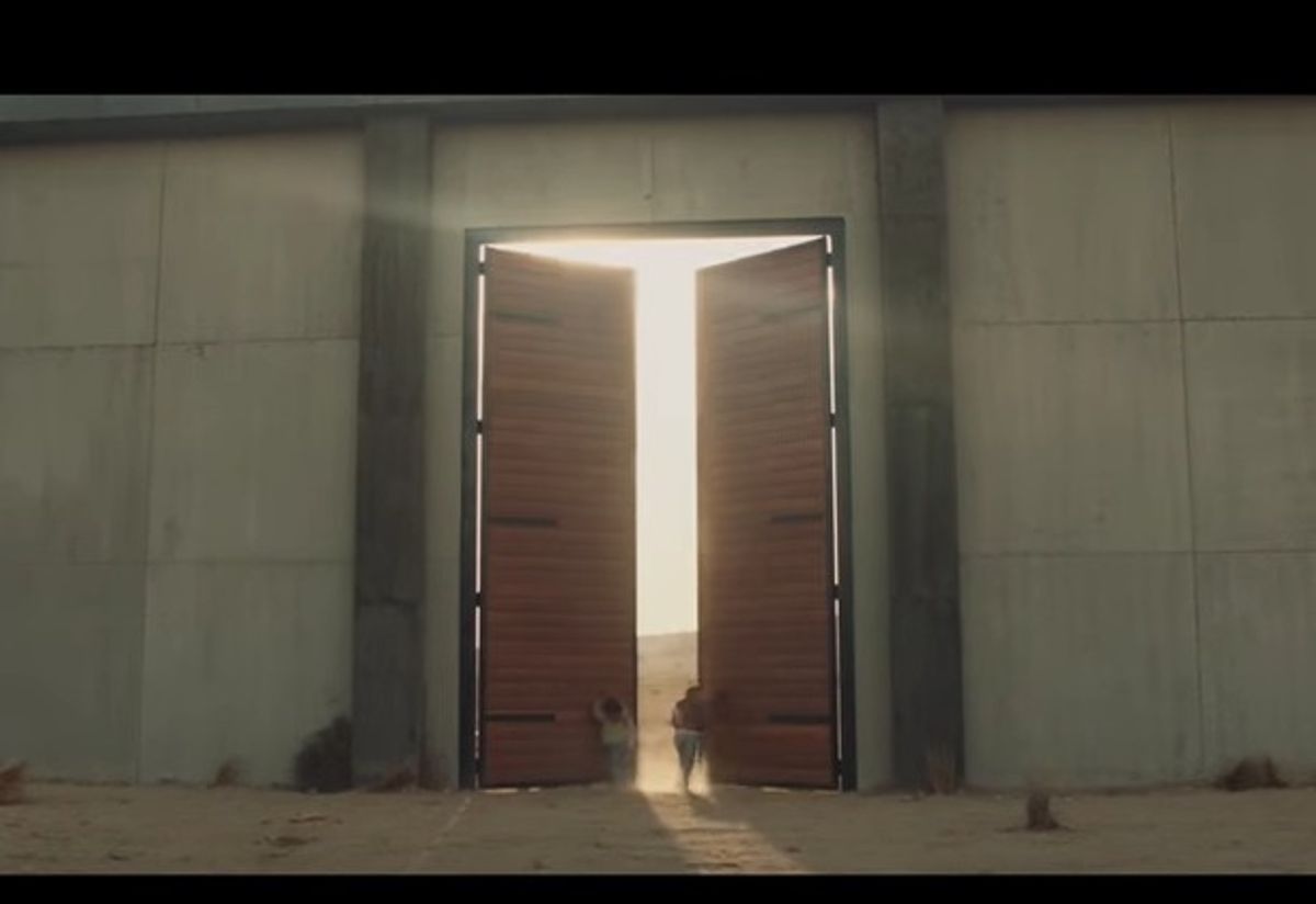 A mother and daughter find a door in a border wall from Mexico in 84 Lumber's controversial Super Bowl 51 spot. (84 Lumber)