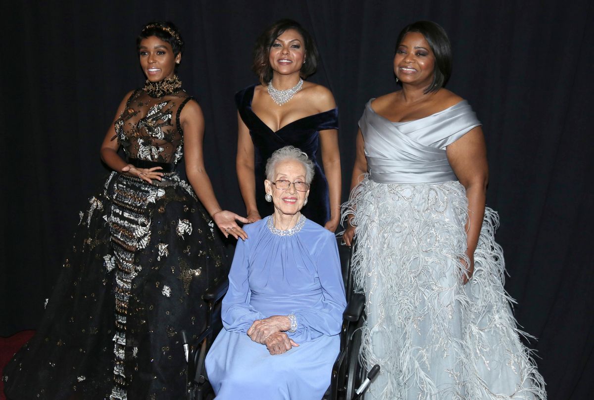 Janelle Monae, from left, Taraji P. Henson, and Octavia Spencer pose with Katherine Johnson, seated, backstage at the Oscars on Sunday, Feb. 26, 2017, at the Dolby Theatre in Los Angeles. (Matt Sayles/Invision/AP)